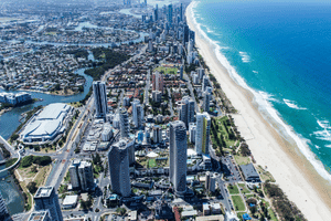 Aerial shot taken during the daytime of the Gold Coast Exhibition and Convention Centre and surrounding city, with the beach to the right. Source: Gold Coast Exhibition and Convention Centre