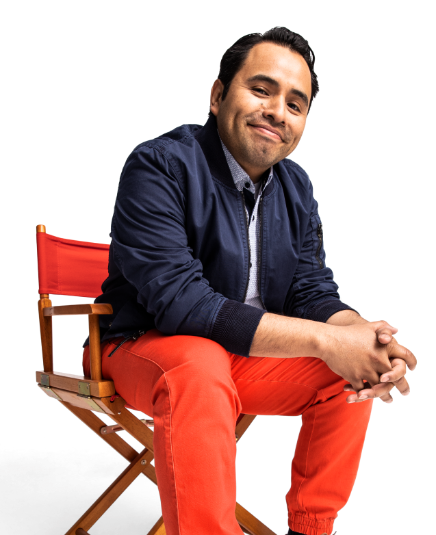 MAN SITTING IN CHAIR